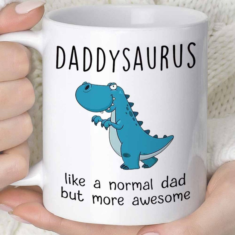 Tailorly White Ceramic 11 oz Mug - Daddysaurus Like A Normal Dad But More Awesome Friendly Blue Cartoon Tyrannosaurus Rex Standing On A White Background Dinosaur