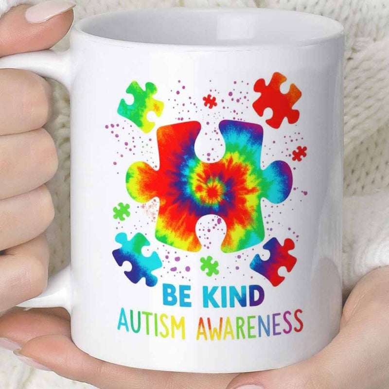 Tailorly White Ceramic 11 oz Mug - Be Kind Autism Awareness Colorful Tie Dye Pattern Surrounded By Floating Small Vibrant Scattered Puzzle Piece