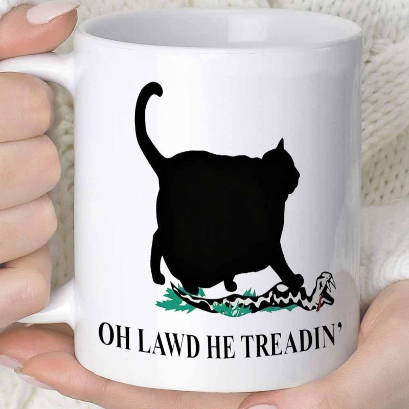 Tailorly White Ceramic 11 oz Mug - Oh Lawd He Treadin Silhouette Of A Large Black Cat Stepping Onto A Rattlesnake Cat
