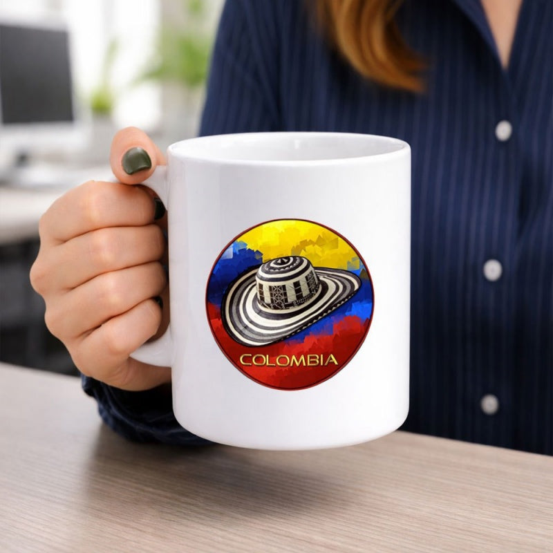 Tailorly White Ceramic 11 oz Mug - Colombia Traditional Striped Sombrero Vueltiao Resting Against Vibrant National Flag Colors Hat