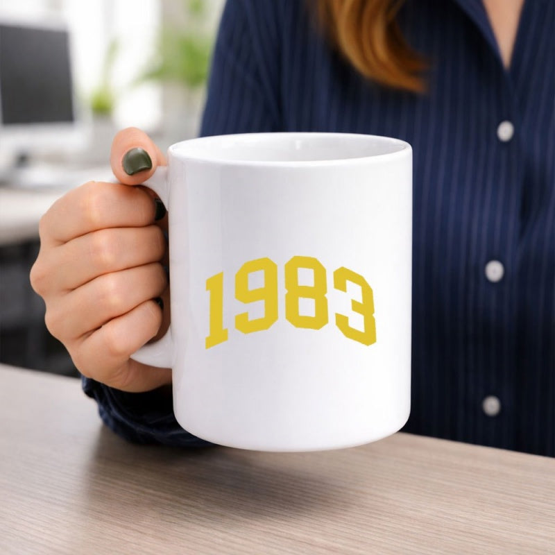 Tailorly White Ceramic 11 oz Mug - 1983 Bold Yellow Varsity Style Athletic Collegiate Numbers Arched Across The Surface Number