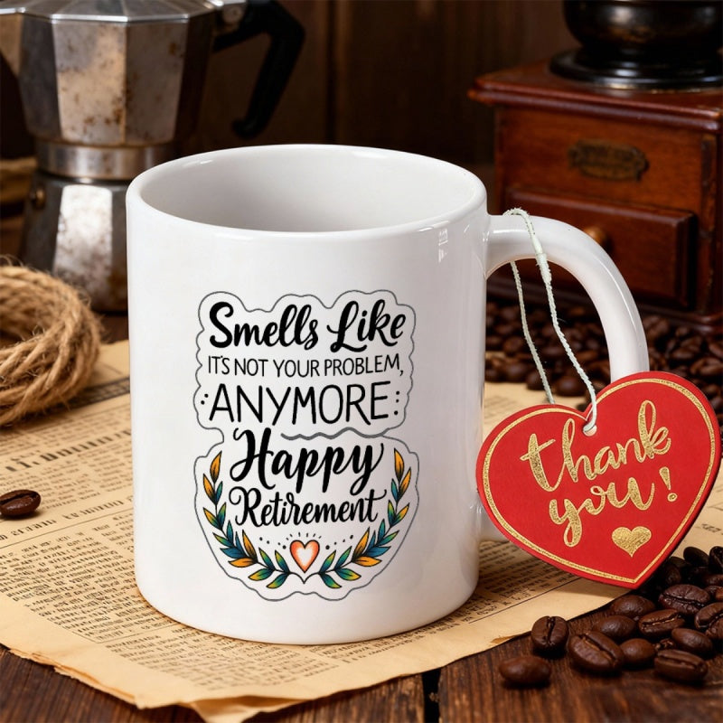 Tailorly White Ceramic 11 oz Mug - Smells Like Its Not Your Problem Anymore Happy Retirement Artistic Script Typography Featuring Decorative Green Foliage And