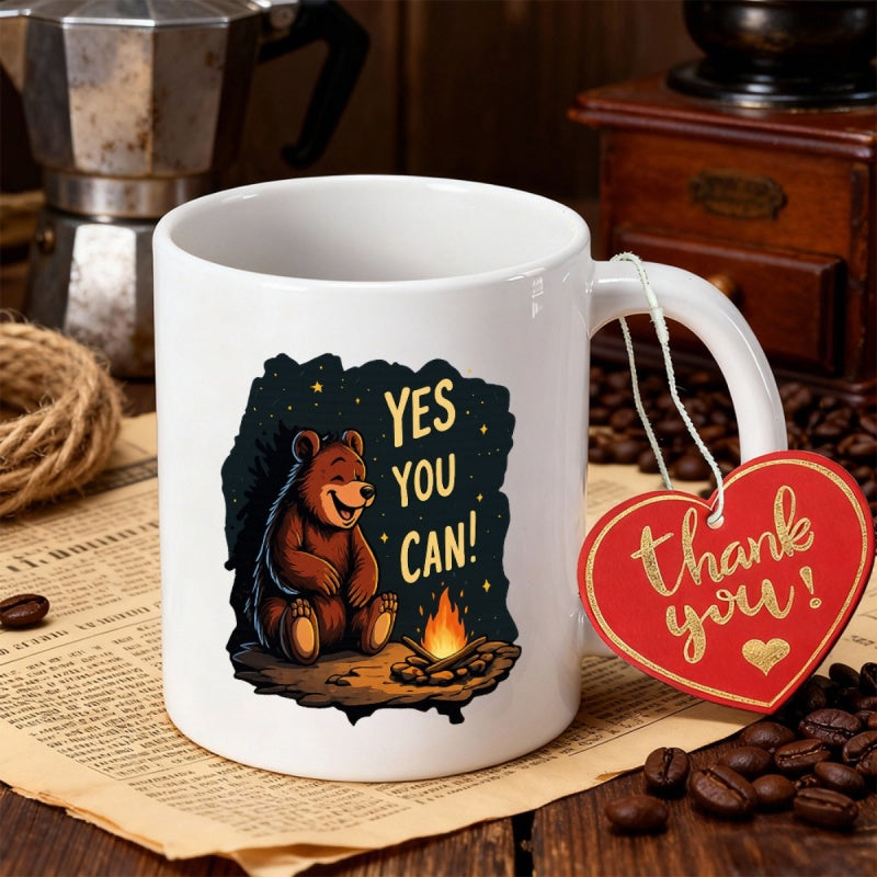 Tailorly White Ceramic 11 oz Mug - Yes You Can Thank You Smiling Brown Cub Sitting Peacefully Beside A Warm Glowing Outdoor Campfire Bear