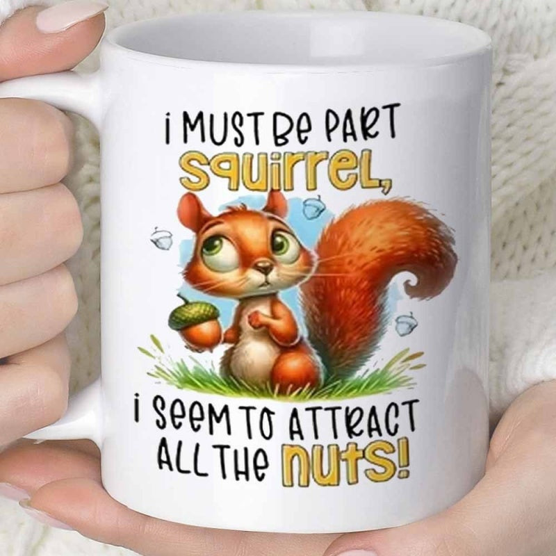 Tailorly White Ceramic 11 oz Mug - I Must Be Part Squirrel I Seem To Attract All The Nuts Cute Cartoon Animal Holding Acorn Resting On Green Grass Squirrel