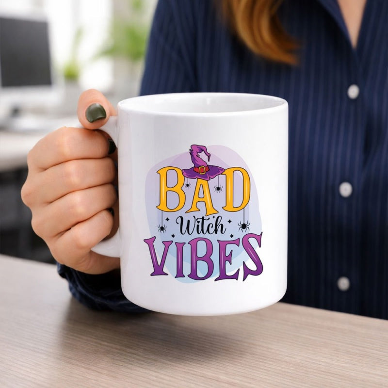 Tailorly White Ceramic 11 oz Mug - Bad Witch Vibes Purple Witch Hat Decorated With Spiders Hanging From Stylized Golden Text Hat