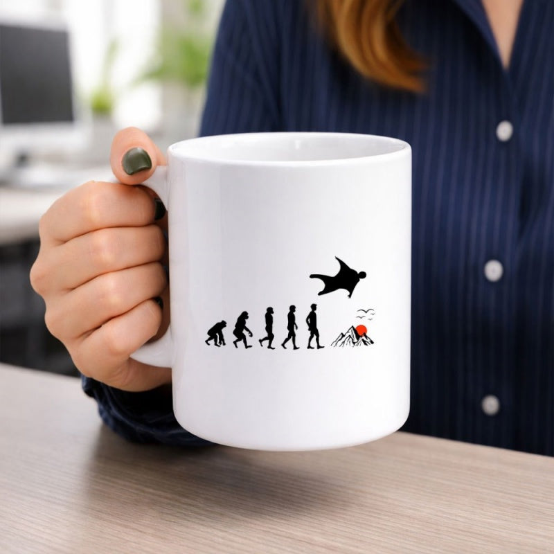Tailorly White Ceramic 11 oz Mug - Silhouette Evolution Sequence Progressing From Primal Ape To Soaring Wingsuit Flyer