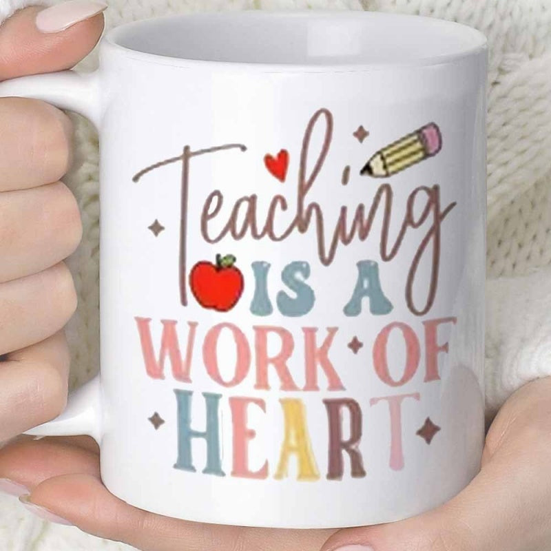 Tailorly White Ceramic 11 oz Mug - Teaching Is A Work Of Heart Colorful Retro Typography Featuring A Pencil And Small Red Apple Heart
