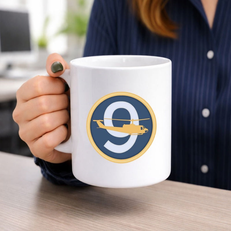 Tailorly White Ceramic 11 oz Mug - Circular Golden Bordered Emblem Featuring Silhouette Military Helicopter Over Number Nine Helicopter