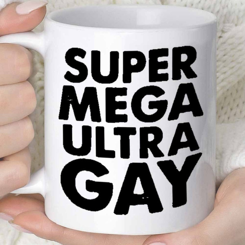 Tailorly White Ceramic 11 oz Mug - Super Mega Ultra Gay Minimalist Ceramic Drinking Vessel With Bold Black Lettering On White Surface Mug