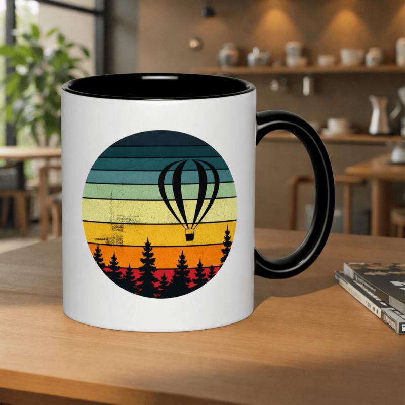 Tailorly Black Accent 11 oz Mug - hot air balloon journey above sunset forest