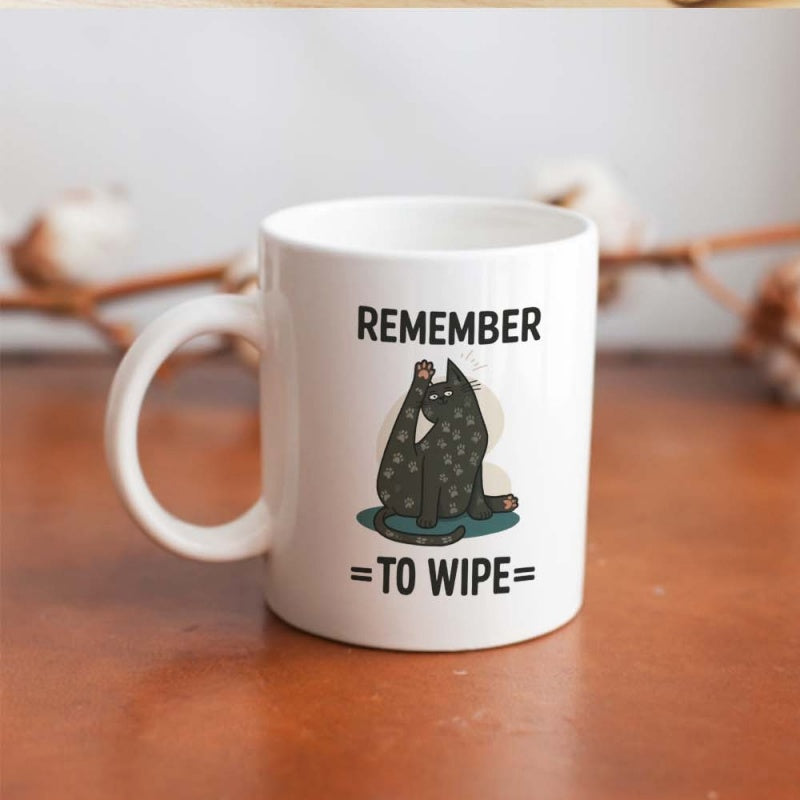 Tailorly White Ceramic 11 oz Mug - cute black cat stretching with text "remember to wipe this"