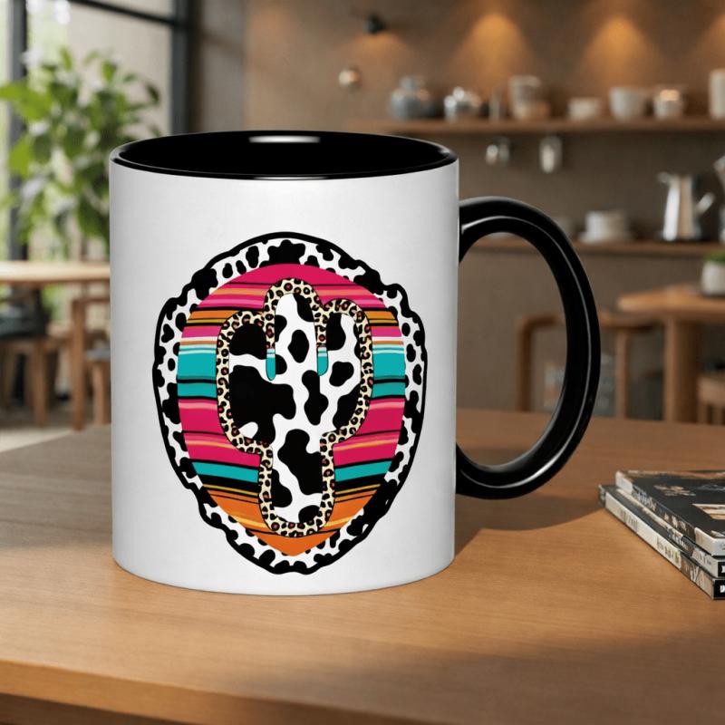 Tailorly Black Accent 11 oz Mug - colorful southwestern design featuring a cow print cactus with boho stripes