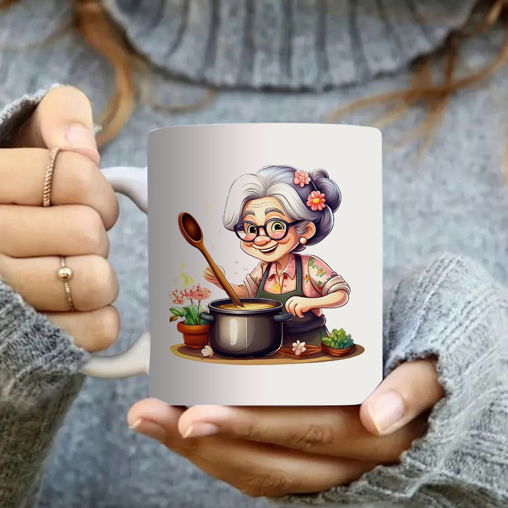 Tailorly White Ceramic 11 oz Mug - scene with a cooking soup surrounded by flowers and herbs