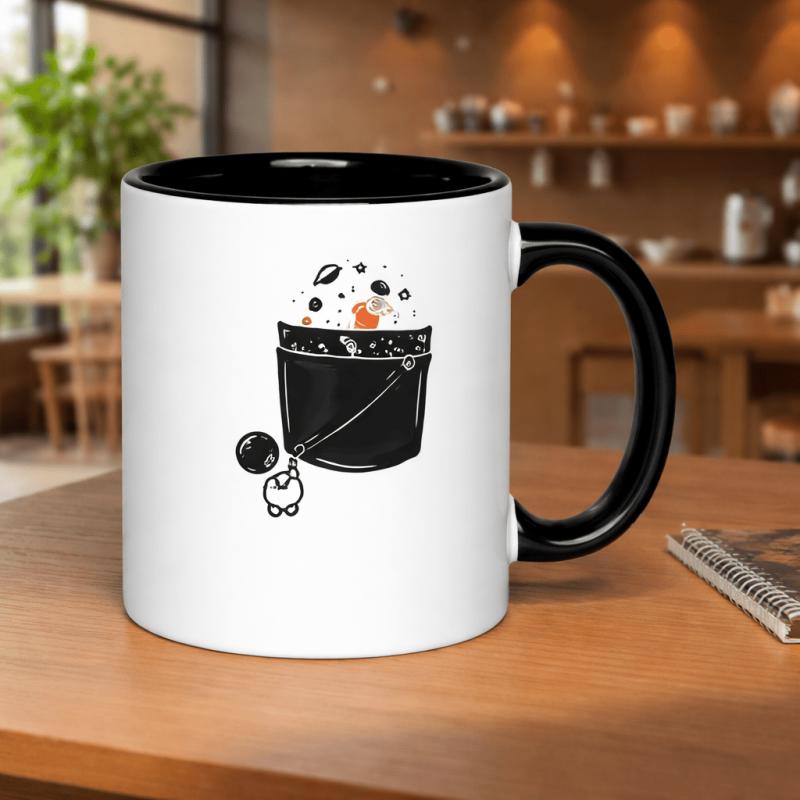 Tailorly Black Accent 11 oz Mug - a bucket filled with space and stars with a small astronaut