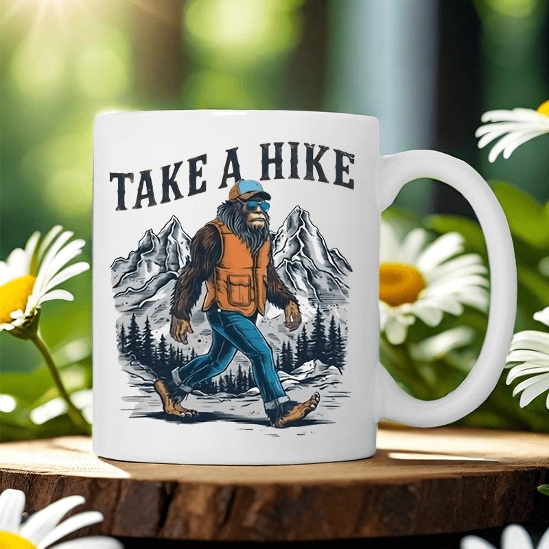 Tailorly White Ceramic 11 oz Mug - sasquatch hiking illustration