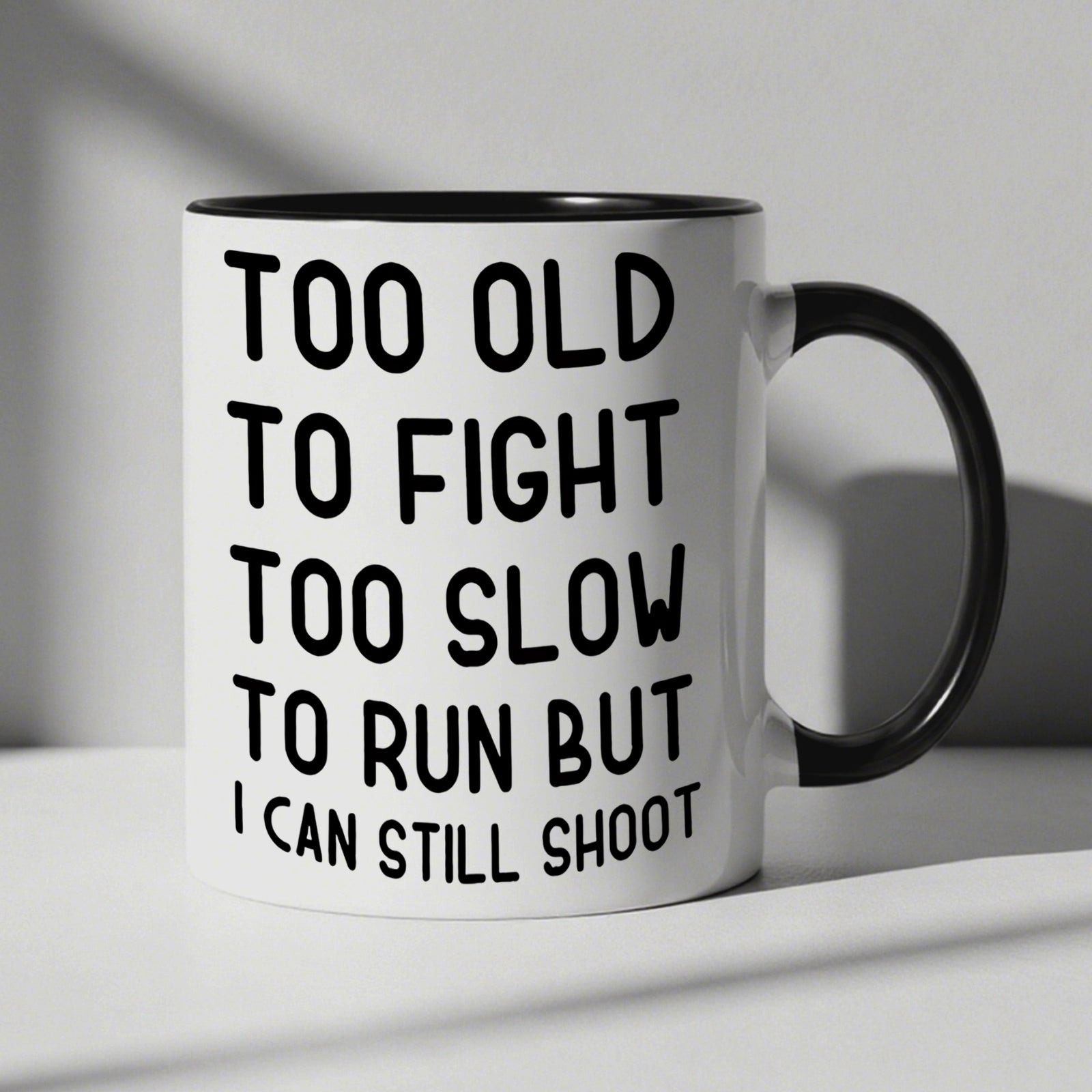 Tailorly Black Accent 11 oz Mug - funny aging humor coffee mug with lettering "too old to fight too slow but i can still shoot"