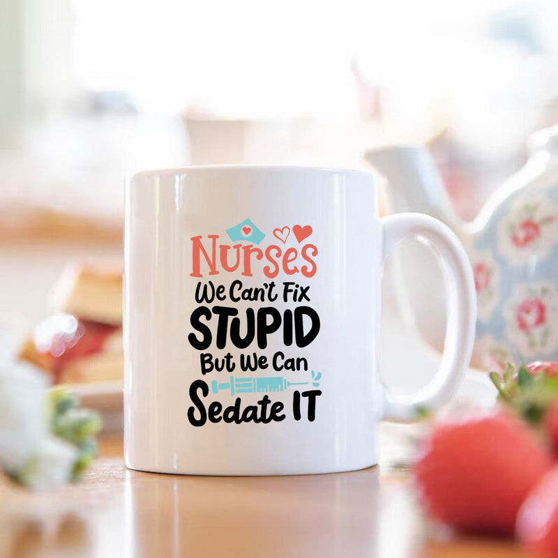 Tailorly White Ceramic 11 oz Mug - nurses can't fix stupid but can