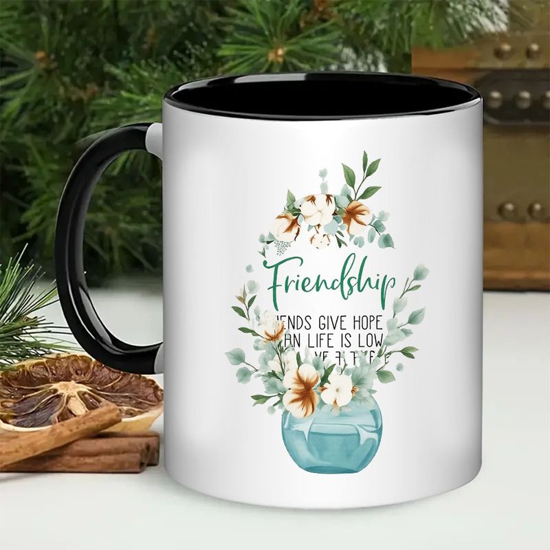 Tailorly Black Accent 11 oz Mug - floral pattern and the word "friendship"